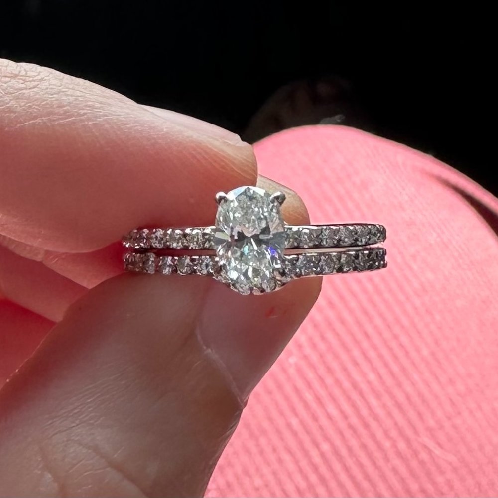Engagement ring and wedding band (soldered together by jeweler).
